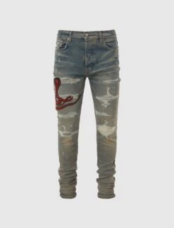 Amiri RED SNAKE THRASHER JEAN